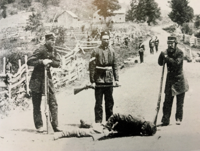Border Volunteers with slain Fenian at Eccles Hill.
